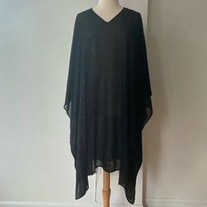 Adolfo Dominguez poncho